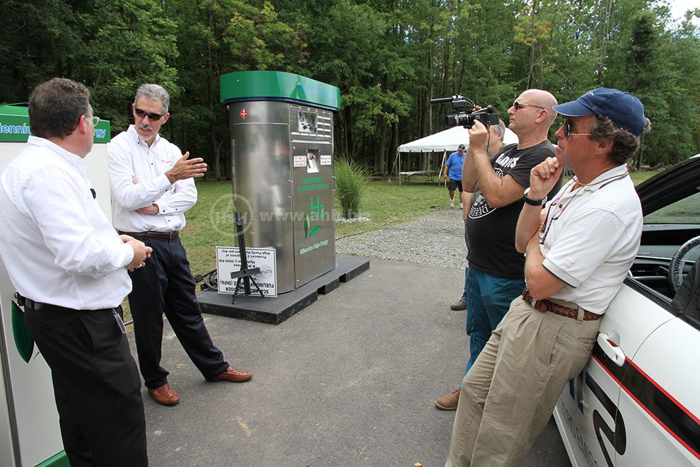 Toyota and Millennium Reign company reps discuss how their products will work together to replace fossil fuels in transportation